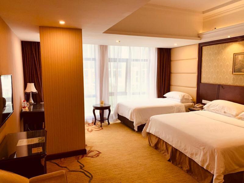 Vienna Hotel Shanghai Happy Valley Songjiang Exterior foto